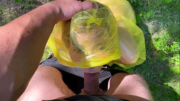 b. in pvc raincoat sucks an swallow dick