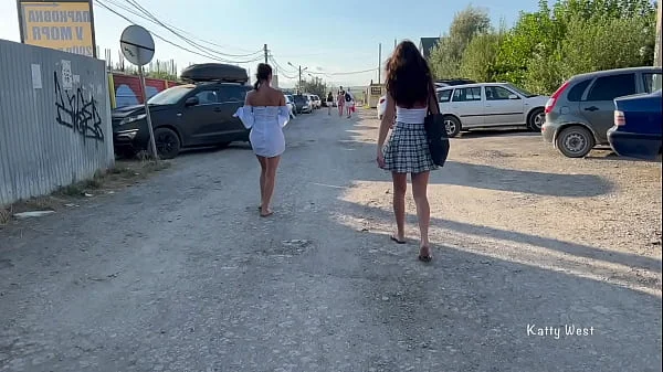 Two girls walk in public without panties and show pussies